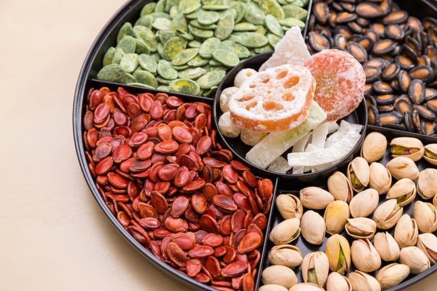 Auspicious candy box for chinese new year filled with nuts and sweets