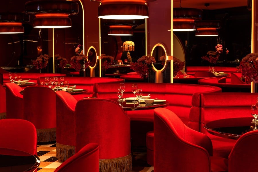 the red velvet booth seats inside grand majestic sichuan restaurant in central
