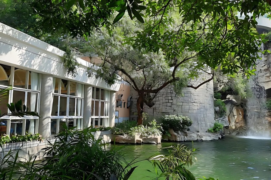 the pond restaurant and the artificial lake at hong kong park in central