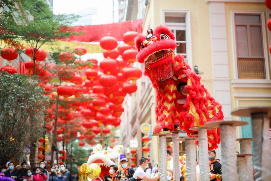 the lion dance on a pillar at lee tung avenue in wan chai