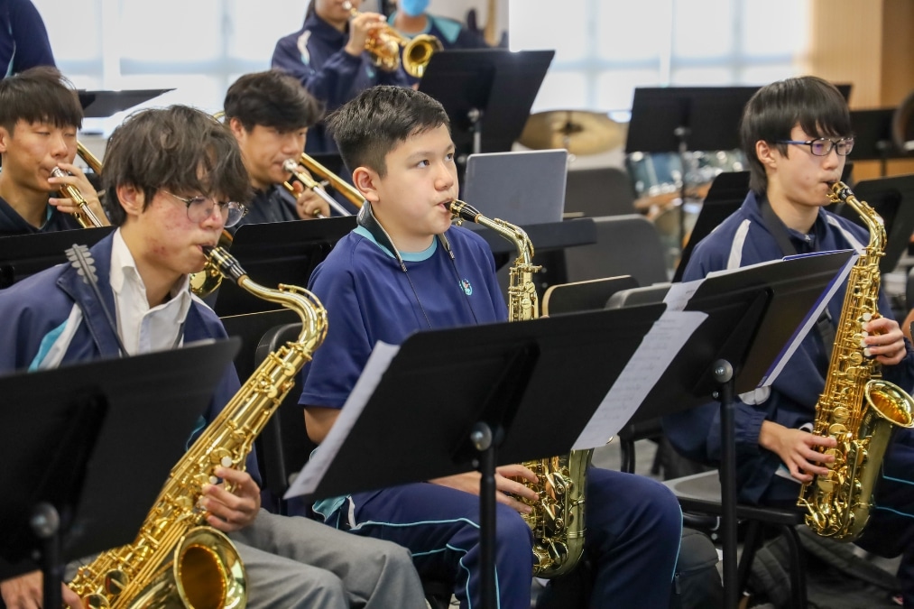 marcus tam playing saxophone