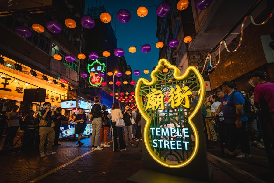 the neon sign at temple street night market