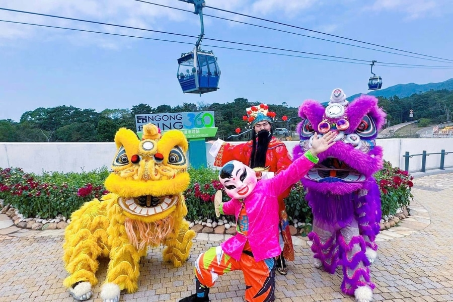the lion dance team posing at ngong ping village