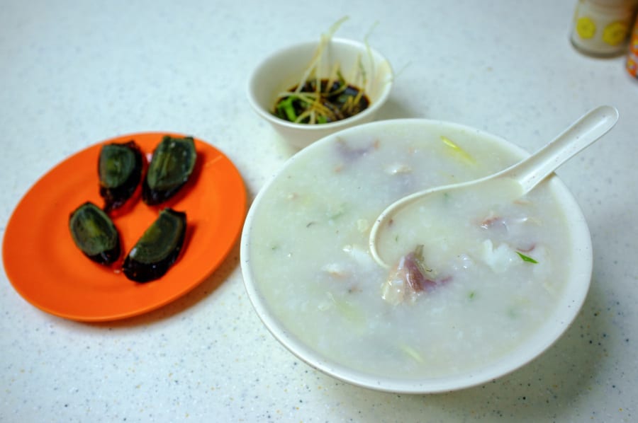 fish congee and century egg side dish from sang kee congee shop