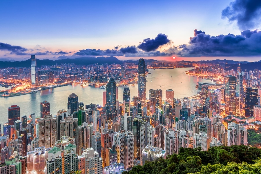 the sunset view of hong kong island and kowloon from the peak