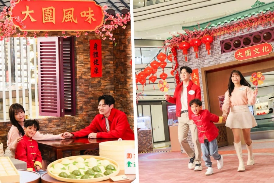 families taking pictures at the chinese new year display of the wai shopping mall in tai wai